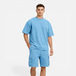 Men's casual summer matching T-shirt and cargo shorts set by FJØRNA, featuring comfortable fabric and modern style.