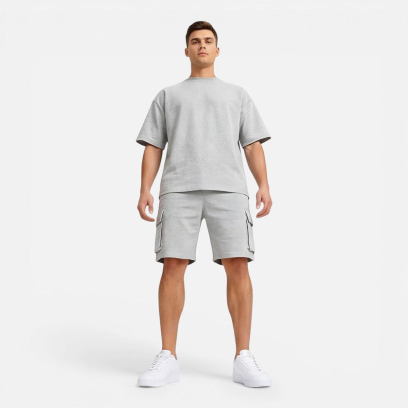 Men's casual summer matching T-shirt and cargo shorts set by FJØRNA, featuring a relaxed fit in lightweight fabric.