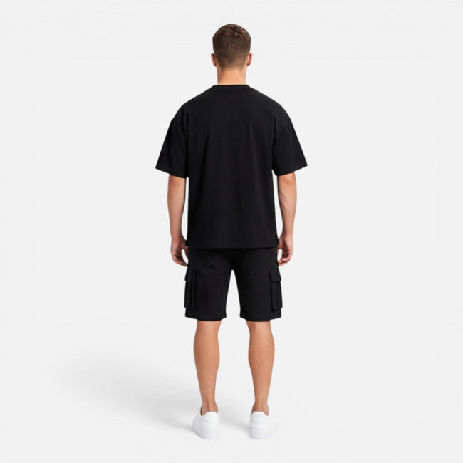 Men's casual summer set by FJØRNA featuring a matching T-shirt and cargo shorts, suitable for warm weather and relaxed style.