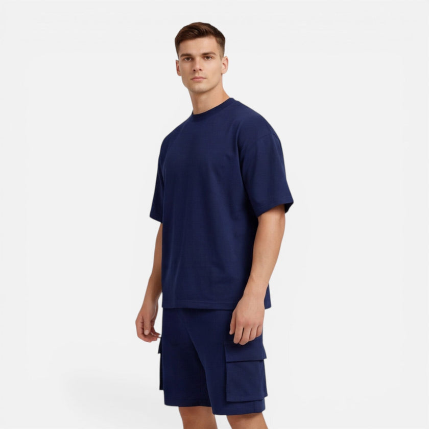 Men's casual summer set by FJØRNA featuring a matching T-shirt and cargo shorts, ideal for relaxed outdoor wear.