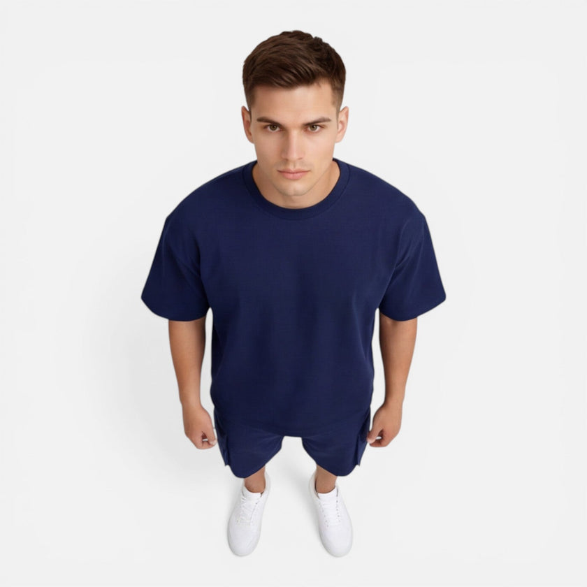 Men's casual summer T-shirt and cargo shorts set by FJØRNA, featuring a relaxed fit and comfortable fabric.