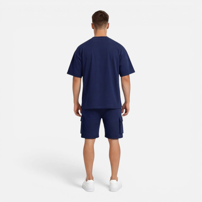 Men's casual summer set with matching T-shirt and cargo shorts by FJØRNA, featuring comfortable fabric and relaxed fit.