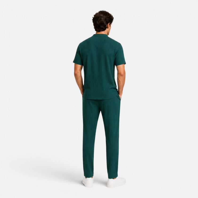 Men's summer matching set by FJØRNA featuring a lightweight shirt and trousers, ideal for casual warm-weather wear.