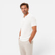 Men's textured knit polo shirt by FJØRNA, lightweight summer shirt with a stylish knit pattern, suitable for casual warm-weather wear.