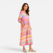 FJØRNA women's striped maxi dress with flowing fabric and bold horizontal stripes, perfect for casual or summer wear.