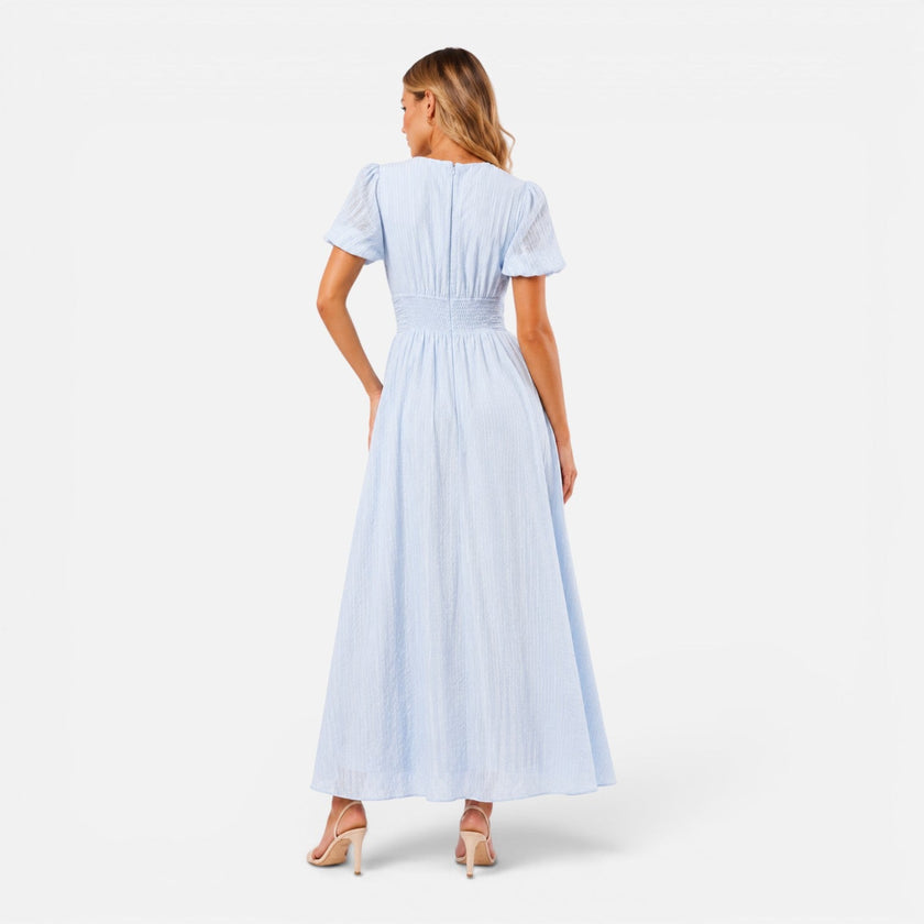 Women's maxi dress by FJØRNA featuring a deep V-neckline and puff sleeves, perfect for formal occasions.
