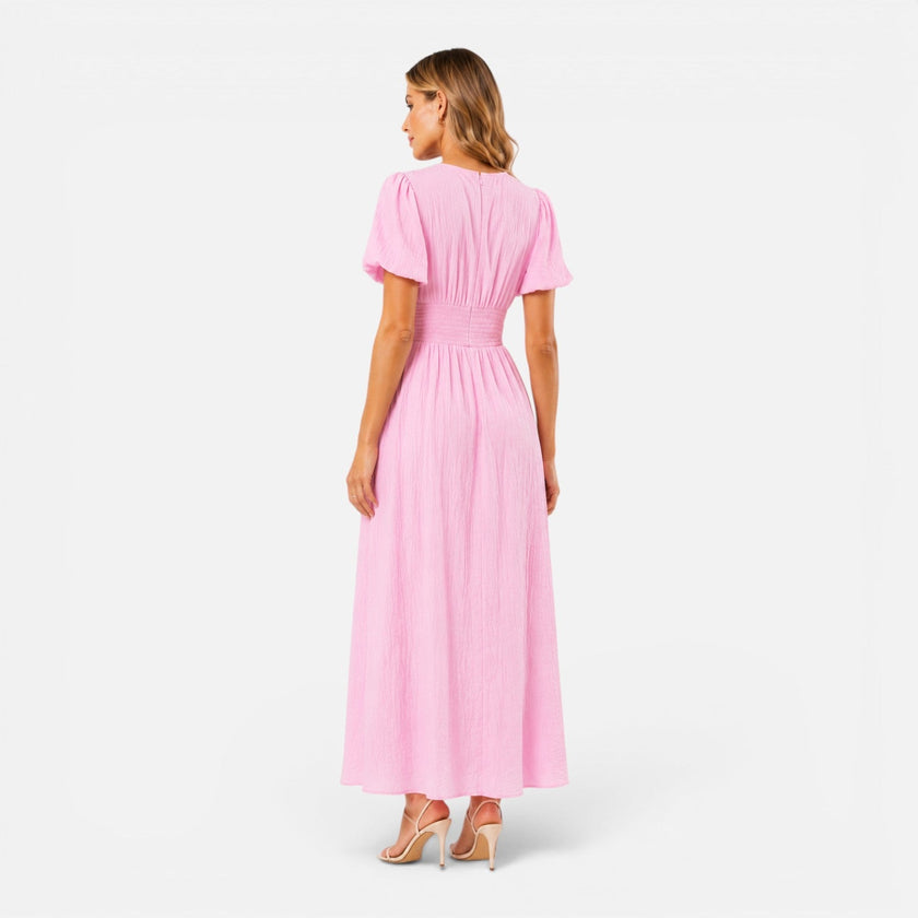 Women's maxi dress by FJØRNA featuring a deep V-neckline and puff sleeves, elegant formal dress for women.