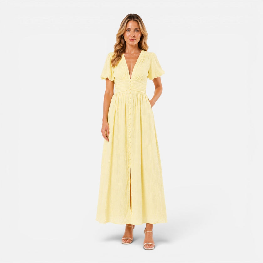FJØRNA women's maxi dress with deep V-neckline and puff sleeves, elegant formal dress perfect for special occasions.