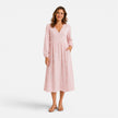 FJØRNA women's floral midi dress with a flowy silhouette, featuring vibrant flower patterns and a midi length for elegant style.