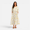 Women's floral midi dress by FJØRNA with a spring and summer design, featuring a lightweight, flowy fabric and vibrant floral pattern.