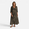 Women's flowy maxi dress with abstract print by FJØRNA, featuring a relaxed fit and stylish design perfect for casual or special occasions.