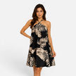 Women's FJØRNA halter mini dress with a flowy summer fit, featuring a sleeveless design and lightweight fabric perfect for warm weather.