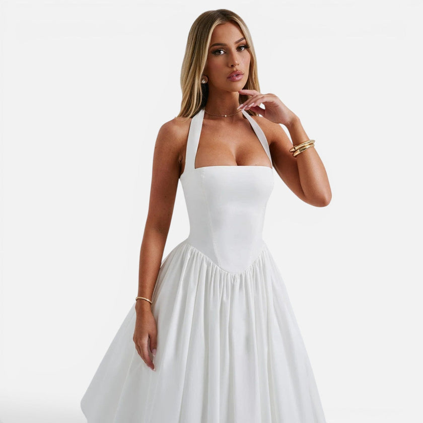 FJØRNA women's halter neck corset midi dress with backless fit and flare design, perfect for party occasions.