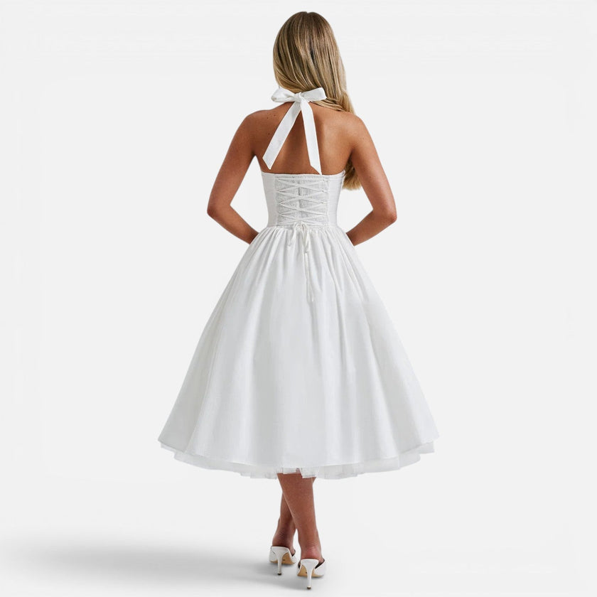 Women's backless halter neck corset midi dress by FJØRNA featuring fit and flare silhouette for party occasions.