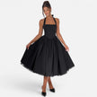 Women's halter neck corset midi dress by FJØRNA, backless fit and flare party dress with a stylish silhouette.
