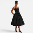 FJØRNA women's halter neck corset midi dress with backless fit and flare design, suitable for parties and special occasions.