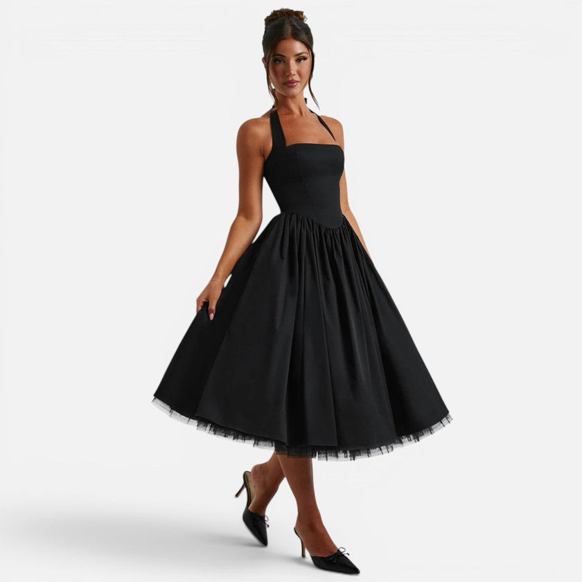 Women's FJØRNA halter neck corset midi dress with backless design, fit and flare silhouette, perfect for parties.