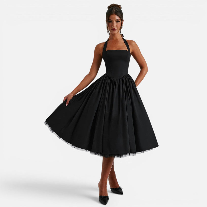 FJØRNA women's backless halter neck corset midi dress with fit and flare silhouette, perfect for parties.