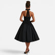 Women's FJØRNA halter neck corset midi dress with backless fit and flare design, perfect for parties and special occasions.