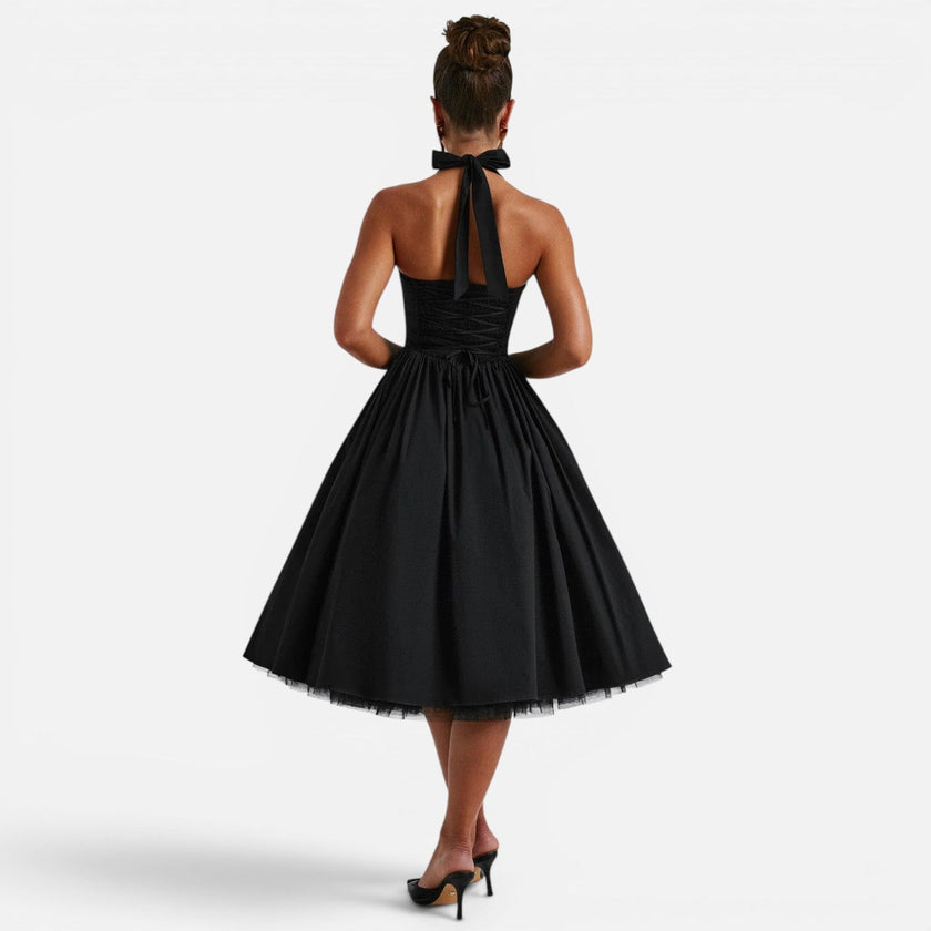 Women's FJØRNA halter neck corset midi dress with backless fit and flare design, perfect for parties and special occasions.