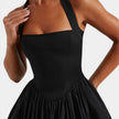 Women's halter neck corset midi dress by FJØRNA, backless fit and flare style, perfect for parties and special occasions.