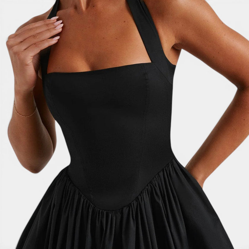Women's halter neck corset midi dress by FJØRNA, backless fit and flare style, perfect for parties and special occasions.