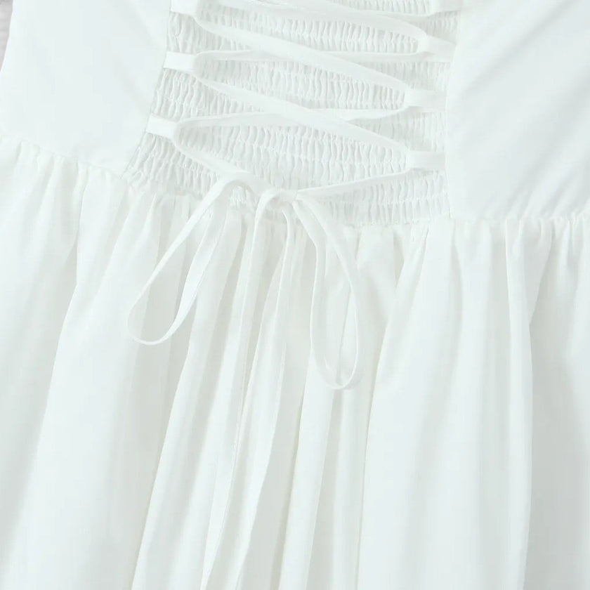 Women's FJØRNA halter neck corset midi dress with backless fit-and-flare design, perfect for parties and elegant occasions.