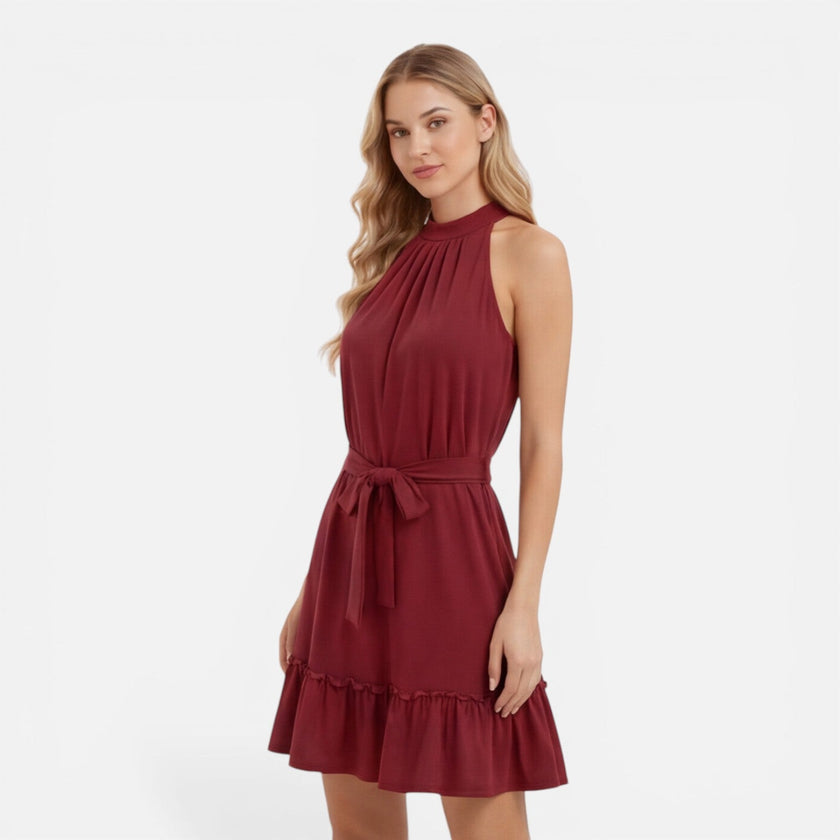 Women's lightweight elegant halter neck summer mini dress by FJØRNA, featuring a stylish design perfect for warm weather.