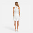 Lightweight women's halter neck summer dress by FJØRNA, elegant mini dress with a flowy fabric and stylish design.