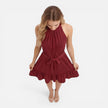 Lightweight women's halter neck summer dress by FJØRNA, featuring an elegant mini style and breathable fabric.