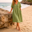 Women's linen beach dress by FJØRNA, casual V-neck midi summer dress with loose fit, perfect for warm-weather outings.