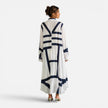 Women's oversized maxi dress by FJØRNA with geometric print, loose fit, elegant design, perfect for casual or dressy occasions.
