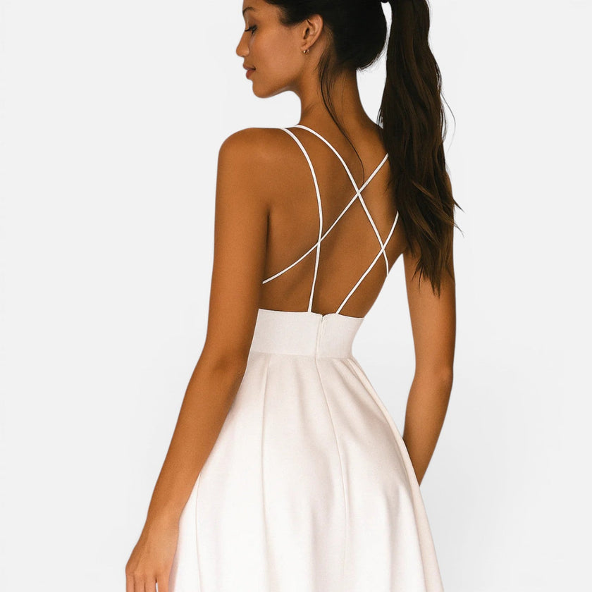 FJØRNA women's wedding guest midi dress with flowing waist cut, elegant design, and soft fabric, perfect for special occasions.