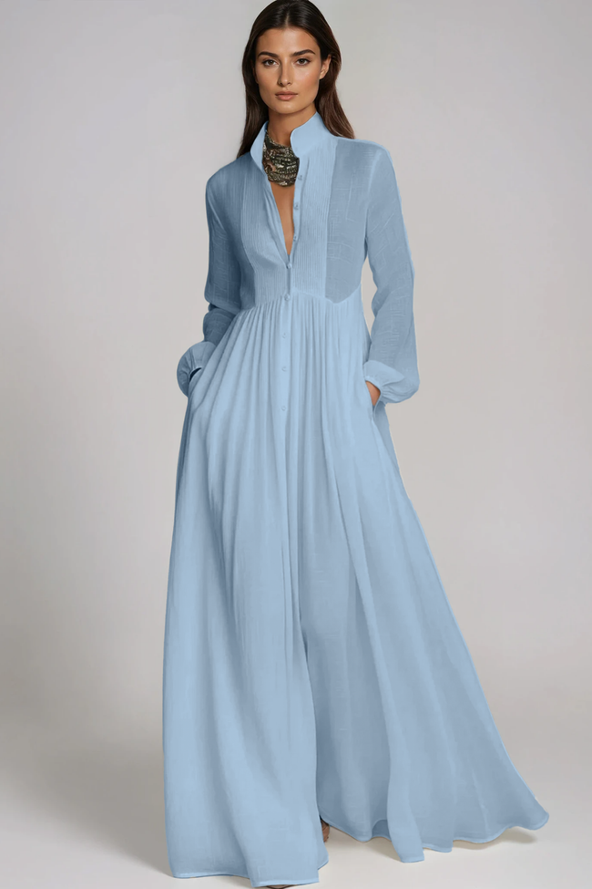 FJØRNA Fizza plunge ruch maxi dress in light blue, flowing fabric with ruching detail and a deep V neckline.