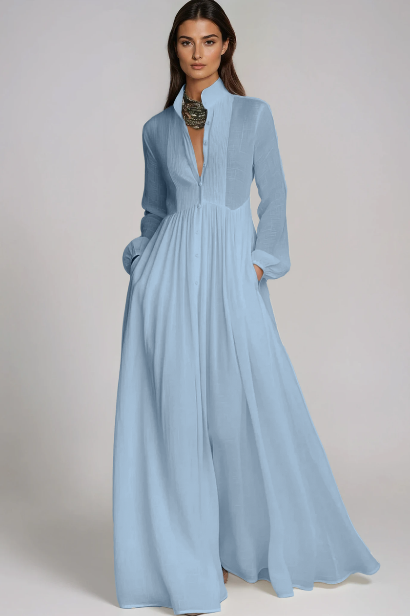 FJØRNA Fizza plunge ruch maxi dress in light blue, flowing fabric with ruching detail and a deep V neckline.
