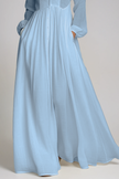 Light blue FJØRNA Fizza plunge ruch maxi dress with flowing fabric and elegant design, perfect for formal occasions.