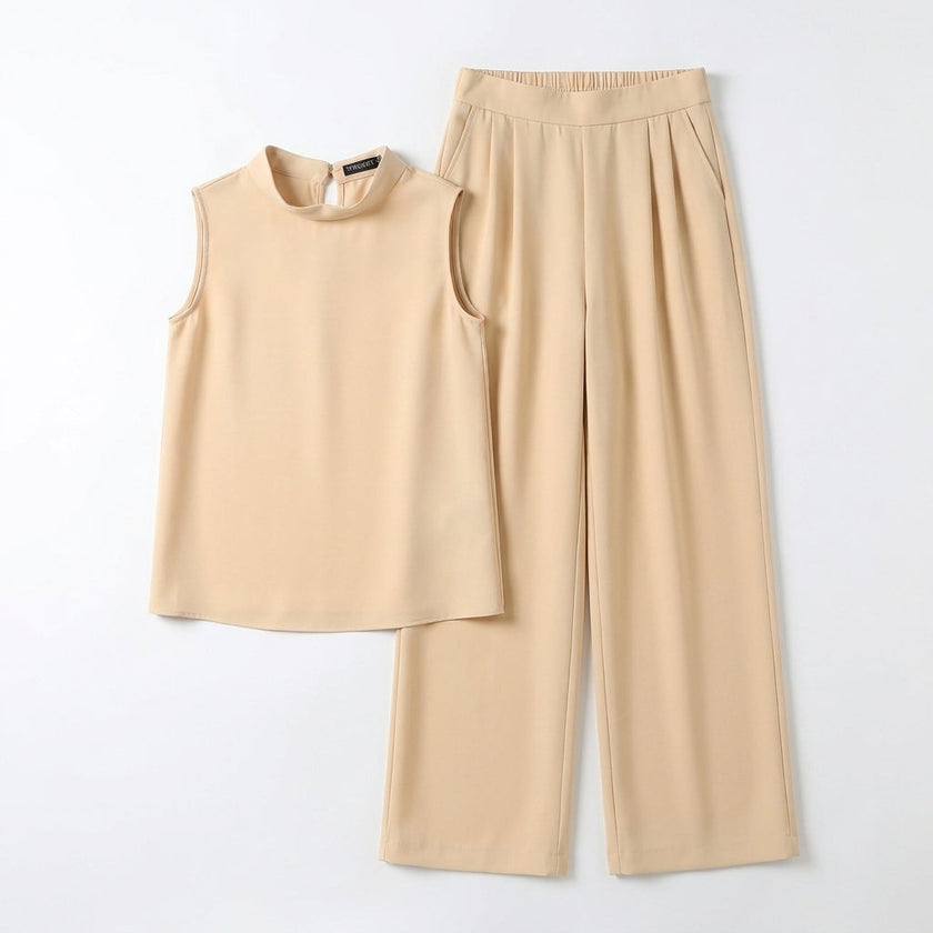 FJØRNA women's elegant two-piece co-ord set with high waist pants and high neck top, flat-lay display in neutral tones