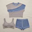 FJØRNA women's summer two-piece bodycon co-ord set laid flat, featuring a fitted top and matching skirt in lightweight fabric.