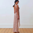 FJØRNA floral high slit maxi dress for women, lightweight summer dress with a flowing design and vibrant floral pattern.
