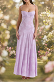 White floral lace-up maxi dress by FJØRNA, flowing design with delicate lace details and a stylish silhouette.