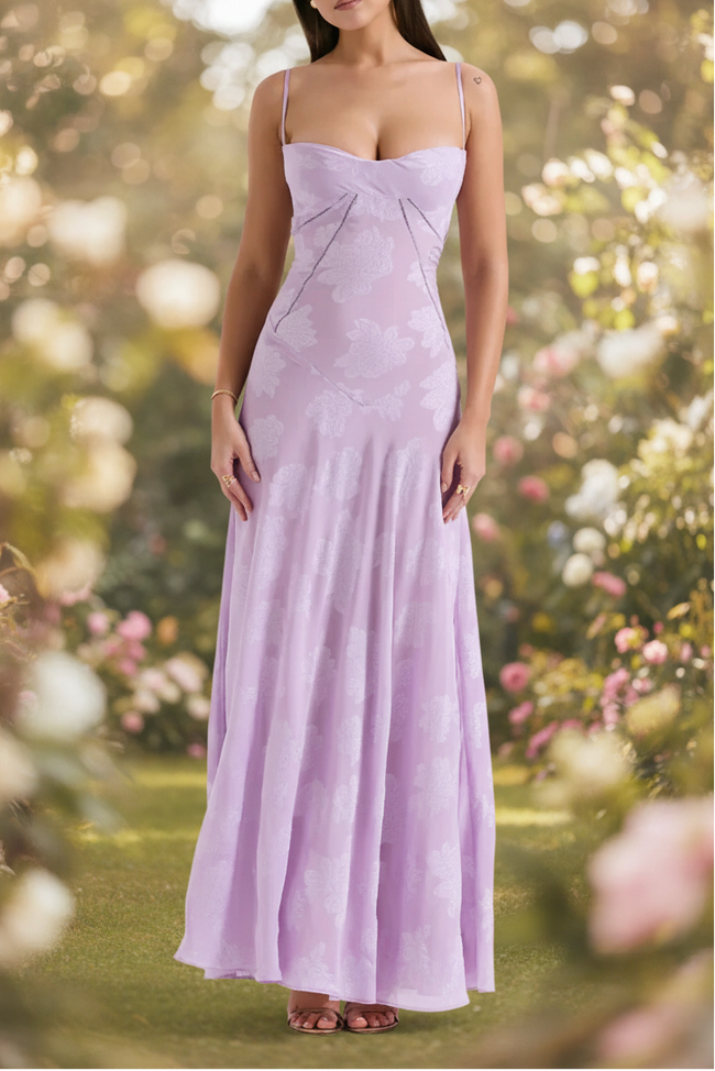White floral lace-up maxi dress by FJØRNA, flowing design with delicate lace details and a stylish silhouette.