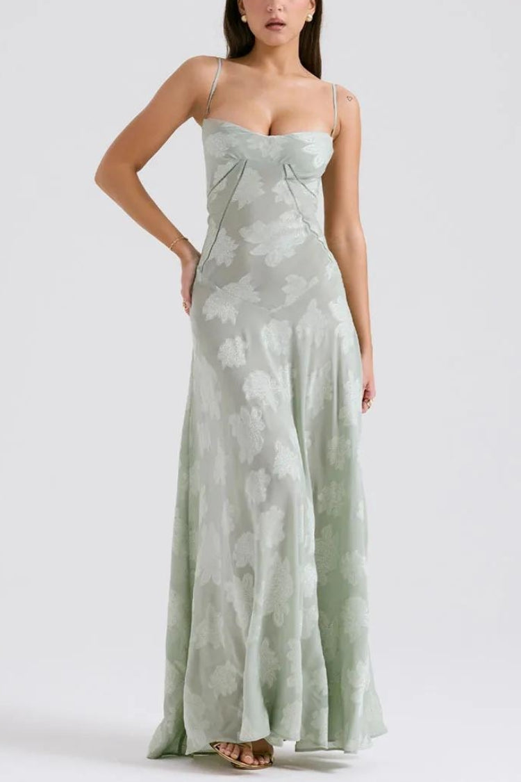 White floral lace-up maxi dress by FJØRNA, featuring a flowing silhouette and intricate lace detailing.