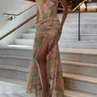 Floral ruched women's maxi dress by FJØRNA featuring a flowy design, perfect for summer and special occasions.