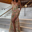 FJØRNA floral ruched women's maxi dress with a flowing skirt, perfect for summer and special occasions.