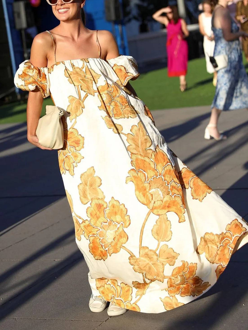 FJØRNA floral print sling dress in mini, midi, or maxi length, featuring vibrant floral patterns and a stylish sleeveless design.