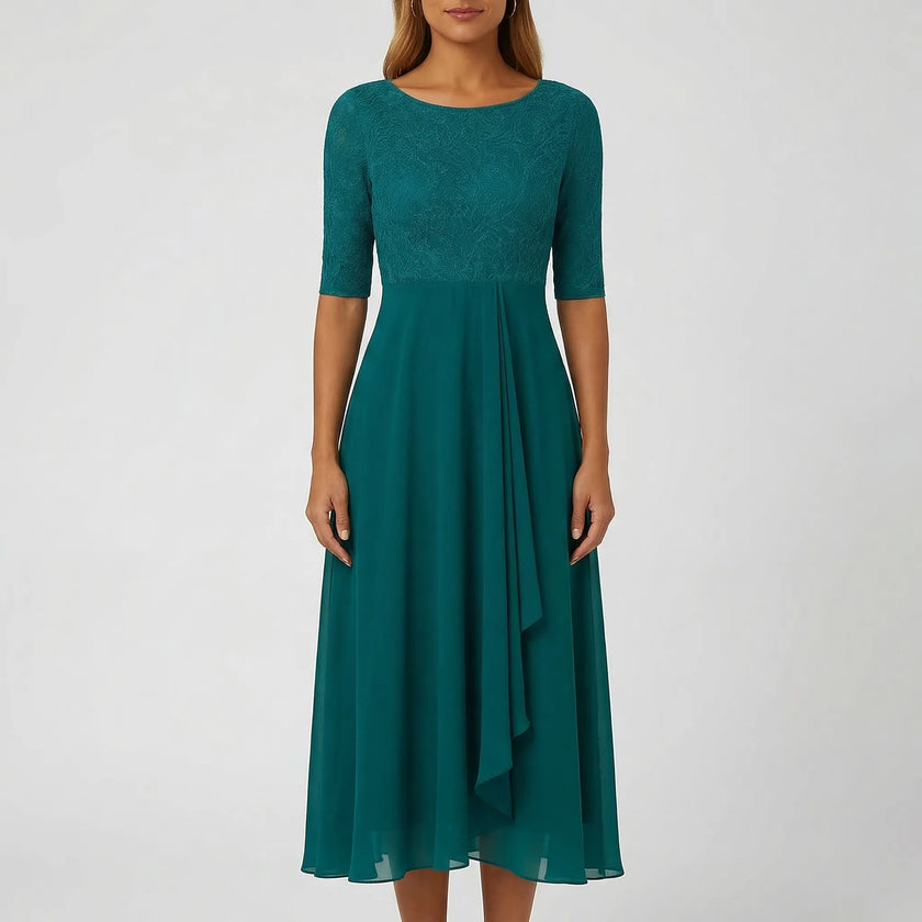 White A-line midi dress by FJØRNA featuring a lace bodice and flowy skirt, perfect for elegant occasions.