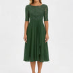 White A-line midi dress by FJØRNA featuring a lace bodice and flowing skirt, perfect for elegant occasions.