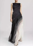 FJØRNA French black high waist patchwork tulle maxi dress, sleeveless with flowing fabric and elegant design.
