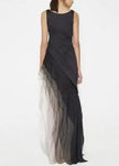 FJØRNA French black high waist patchwork tulle maxi dress, sleeveless with flowing fabric and intricate patchwork design.
