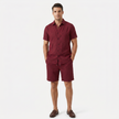 FJØRNA men's linen short sleeve shirt and shorts two-piece set in red, full-body view with footwear.